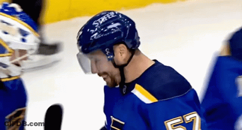 Hockey Player In Number 57 Jersey On Ice GIF