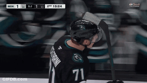 Hockey Player In Number 71 Jersey On Ice GIF