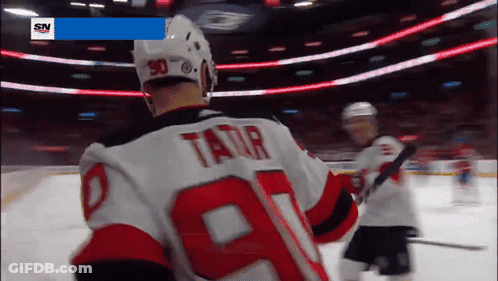 Hockey Player In Number 9 Jersey GIF