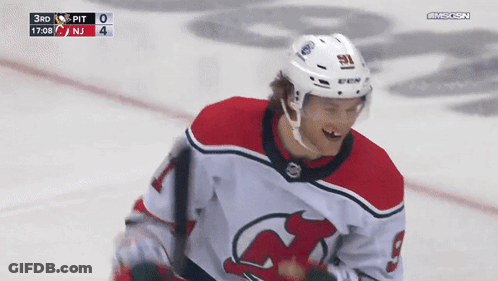 Hockey Player In Number 9 Jersey Smiling GIF