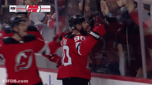 Hockey Player In Number 90 Jersey Celebrates Goal GIF