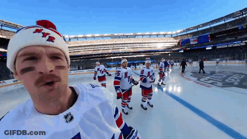 Hockey Player In NYR Hat On Ice With Teammates GIF