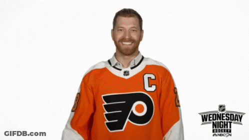 Hockey Player In Orange Jersey With C GIF