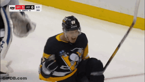 Hockey Player In Pittsburgh Penguins Jersey Kneeling On Ice GIF