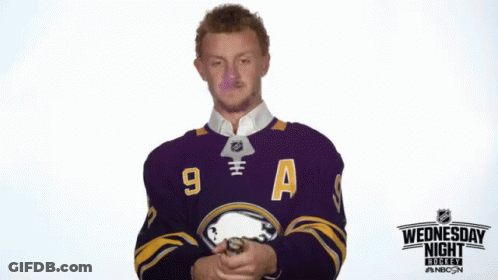 Hockey Player In Purple Jersey Number 9 GIF