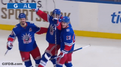 Hockey Player In Rangers Jersey Holding Stick GIF
