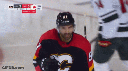 Hockey Player In Red And Black Jersey GIF