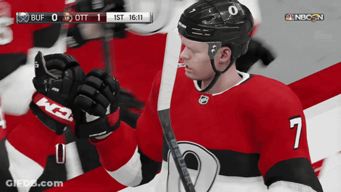 Hockey Player In Red And Black Jersey Number 7 GIF