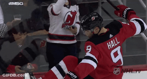 Hockey Player In Red And Black Uniform Hall GIF