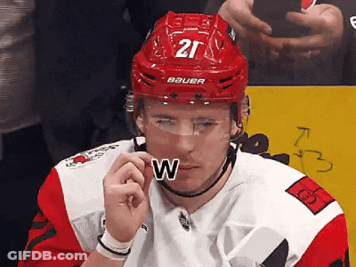 Hockey Player In Red Helmet Number 21 GIF