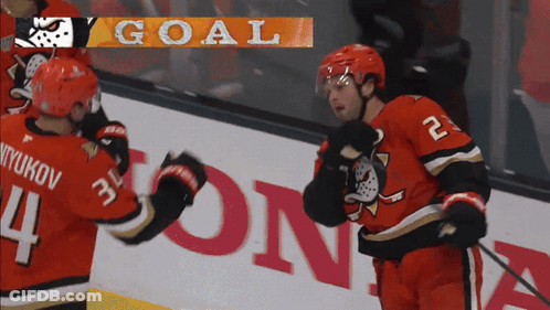 Hockey Player In Red Jersey Number 24 GIF