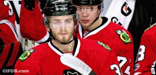 Hockey Player In Red Jersey Number 24 GIF