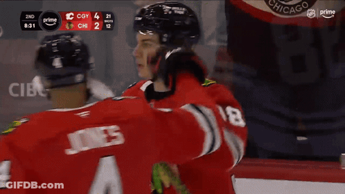 Hockey Player In Red Jersey Number 4 GIF