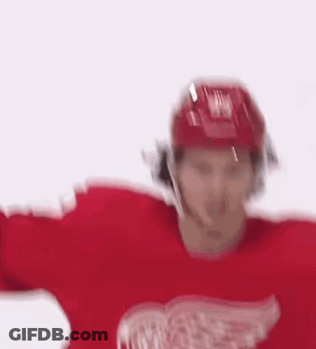 Hockey Player In Red Jersey Number 53 GIF