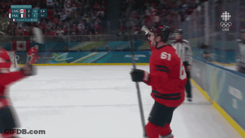 Hockey Player In Red Jersey Number 61 GIF