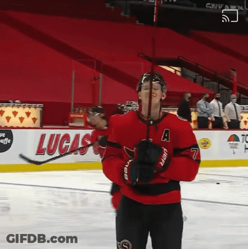Hockey Player In Red Jersey Number 7 GIF