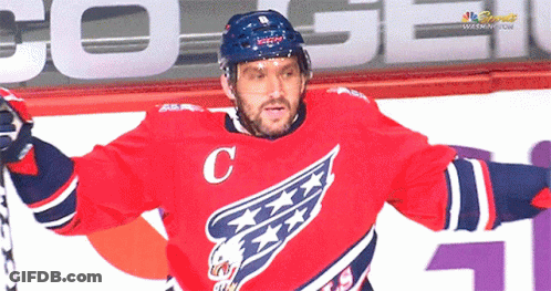 Hockey Player In Red Jersey With C GIF
