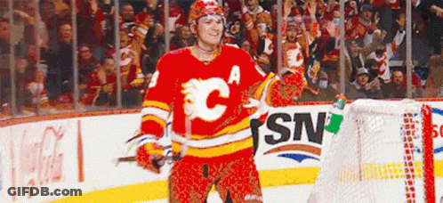 Hockey Player In Red Jersey With C GIF