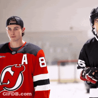 Hockey Player In Red Jersey With Letter A GIF