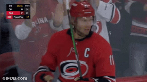 Hockey Player In Red Jersey With Letter C GIF