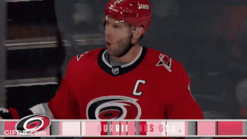 Hockey Player In Red Jersey With Letter C GIF