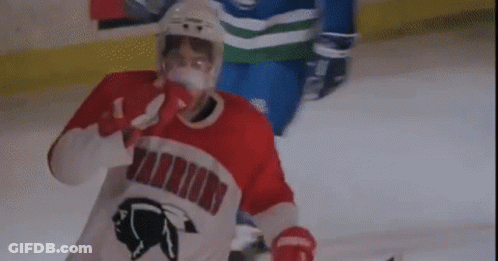 Hockey Player In Red Warriors Jersey On Ice GIF