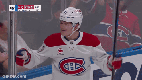Hockey Player In Red White And Blue Jersey Number 13 On Helmet GIF