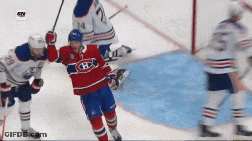 Hockey Player In Red White And Blue Jersey With H GIF