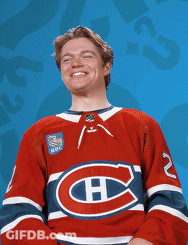 Hockey Player In Red White And Blue Jersey With Letter H GIF