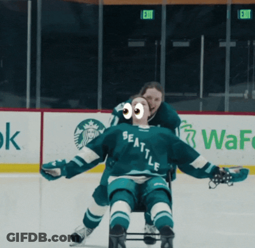 Hockey Player In Seattle Jersey Being Pushed GIF