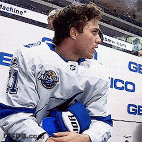 Hockey Player In White And Blue Uniform GIF