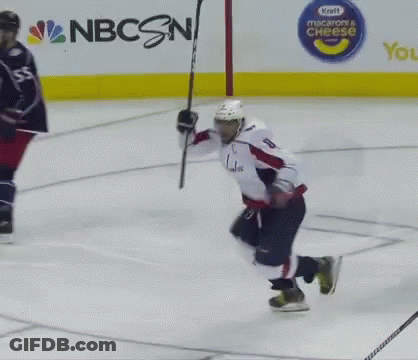 Hockey Player In White Jersey Number 8 Holding Stick GIF