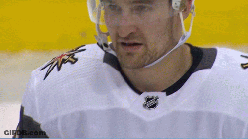 Hockey Player In White NHL Jersey GIF
