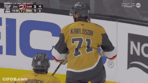 Hockey Player In Yellow Jersey Number 21 GIF