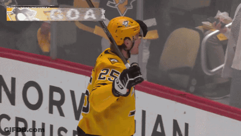 Hockey Player In Yellow Jersey Number 25 GIF