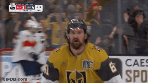 Hockey Player In Yellow Jersey Number 6 GIF
