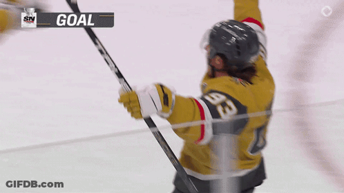 Hockey Player In Yellow Jersey Number 93 GIF