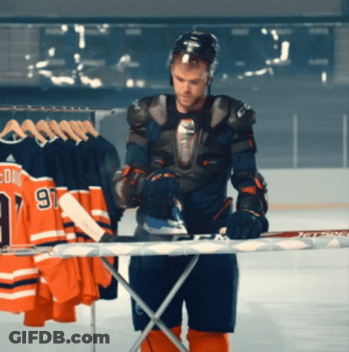 Hockey Player Ironing Stick Number 91 GIF