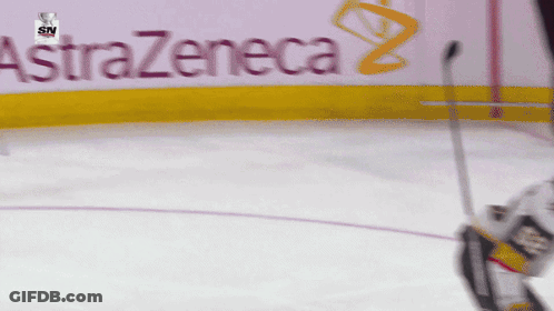 Hockey Player Kicks Puck At AstraZeneca Ad GIF