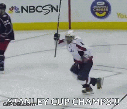 Hockey Player Kneeling Down Holding Stick GIF