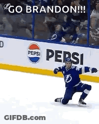 Hockey Player Kneeling On Ice In Front Of Pepsi Sign GIF