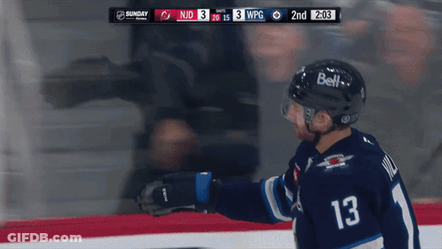 Hockey Player Number 13 Congratulated By Teammates GIF