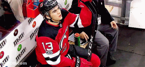 Hockey Player Number 13 In Dugout GIF