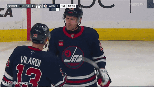 Hockey Player Number 13 Talking To Another Player GIF