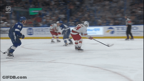 Hockey Player Number 14 Holding Stick GIF