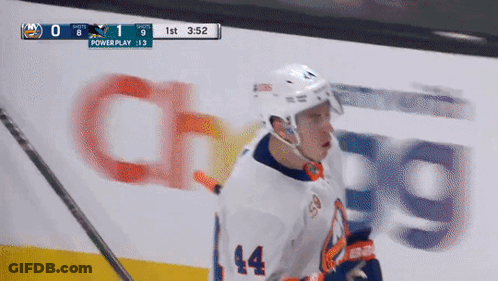 Hockey Player Number 14 In Front Of Power Play Sign GIF