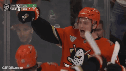 Hockey Player Number 17 Hugging Teammate GIF