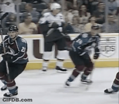 Hockey Player Number 2 Being Chased GIF