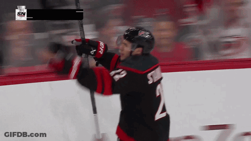 Hockey Player Number 2 Holding Stick GIF