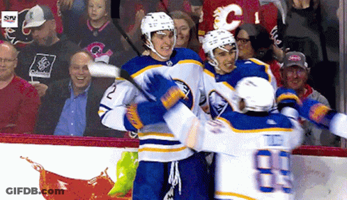 Hockey Player Number 2 Hugged GIF